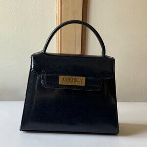 Vintage 90s Perry Ellis America Black Leather Top Handle Bag – Kelly Style